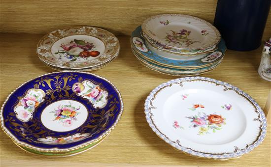 A small collection of decorative floral painted dessert dishes
